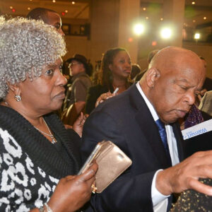 Two people attend a formal event.