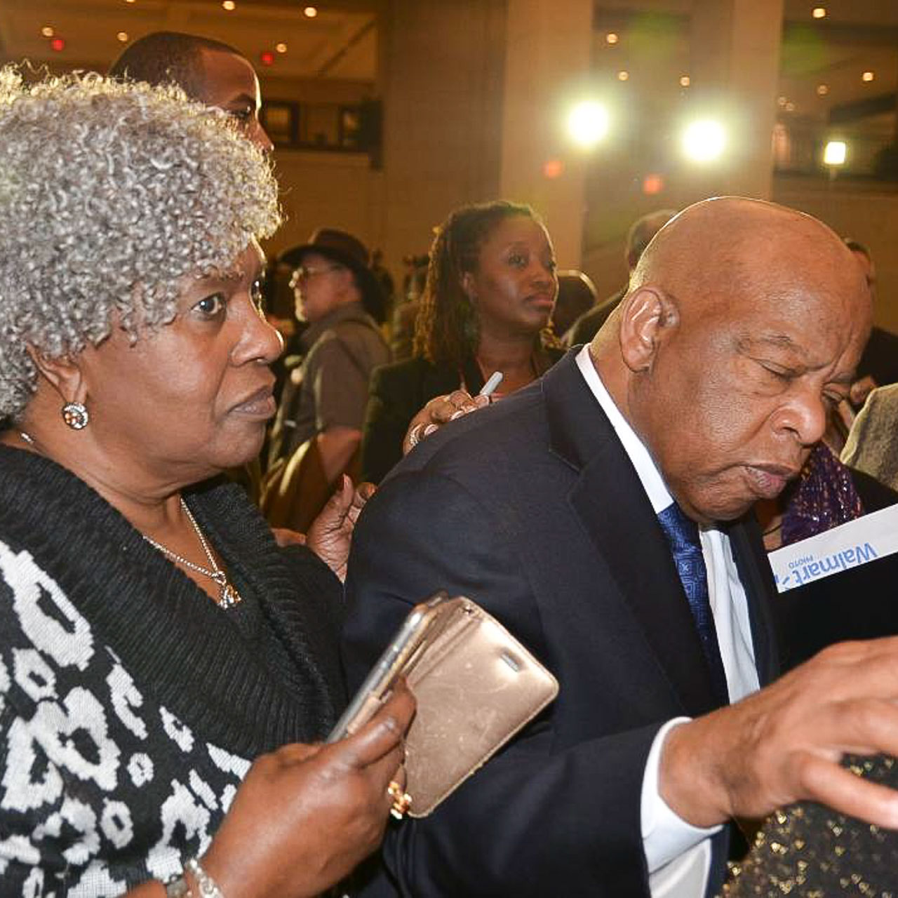 Two people attend a formal event.